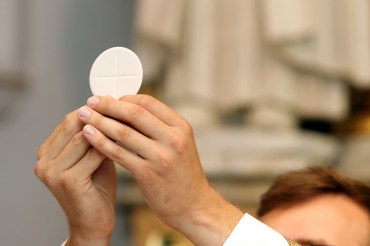 Priest celebrate a mass at the church